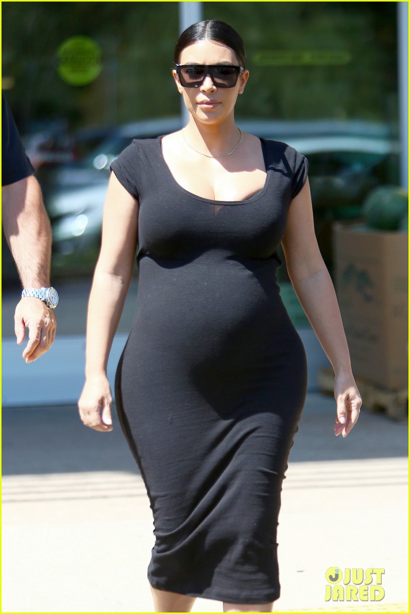 Calabasas, CA - A pregnant and bulging Kim Kardashian exits Erewhon Organic Grocer and Cafe in Calabasas with her bodyguard after filming a scene for her reality show, KUWTK, with sister Courtney and mother Kris Jenner. Kim wore a form fitting black dress with heels once again as she put her large hour glass figure on display. AKM-GSI August 27, 2015 To License These Photos, Please Contact : Steve Ginsburg (310) 505-8447 (323) 423-9397 steve@akmgsi.com sales@akmgsi.com or Maria Buda (917) 242-1505 mbuda@akmgsi.com ginsburgspalyinc@gmail.com